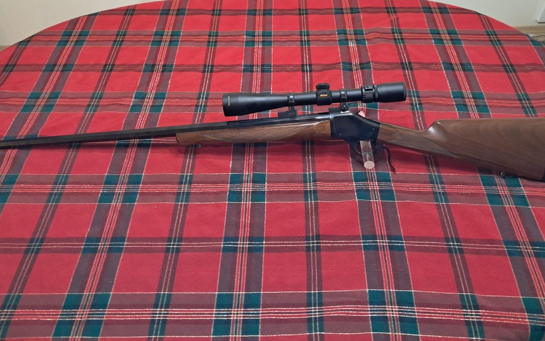 Winchester model 1885 single shot in 22-250 with scope $1050.oo obo