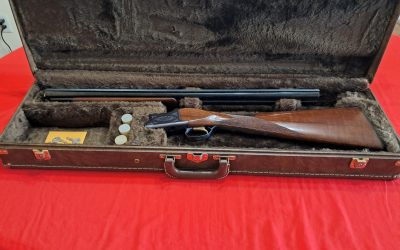 Browning Citori 12ga over under with case asking $3300.oo obo